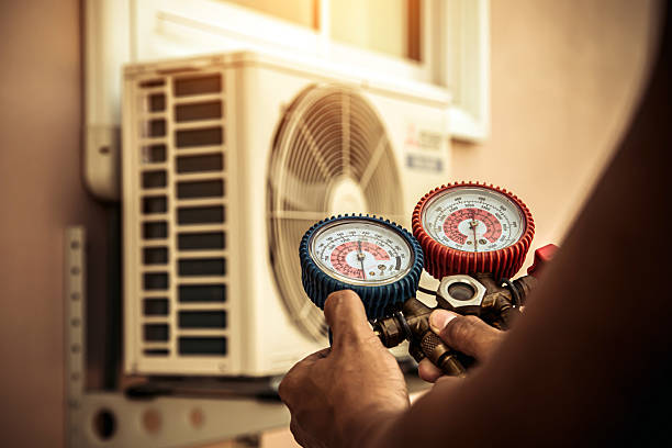 Professional Hvac technician working in Perkins, OK